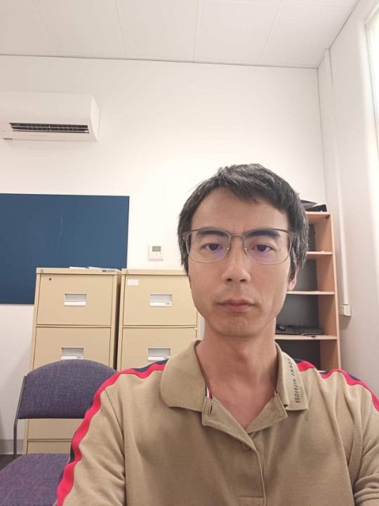 Xuan-Gong Wang